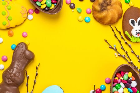 Easter Theme Background. Chocolate Rabbit, Egg and Festive Food.