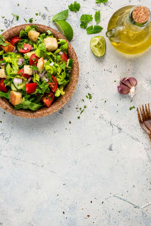 Healthy Fresh Colorful Salad in Edible Plate. Border Background. Eco Cooking.の写真素材