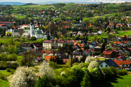 Monastery in Tuchow, Poland at Spring. Colorful Foliage. Sunny Dayの写真素材
