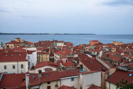 Roofs of Piran in Slovenia at Sunrise. Istria Region Townscape.の写真素材