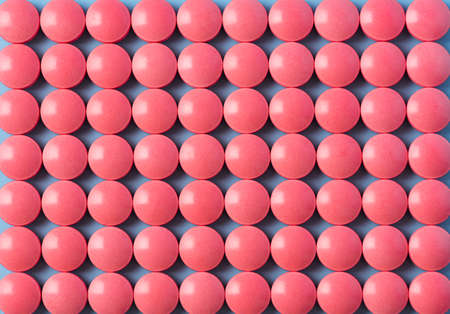 Red Tablets or Medicine Painkiller Pills Background Flat Lay.の写真素材