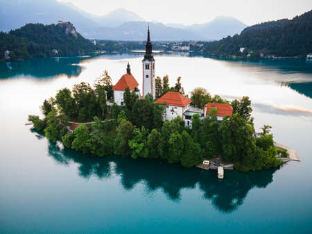 Lake Bled in Slovenia with Church on Island and Bled Castle Drone View.のeditorial素材