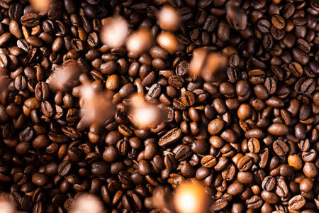 Roasted Coffee Beans Background Texture and Flying Beans.
