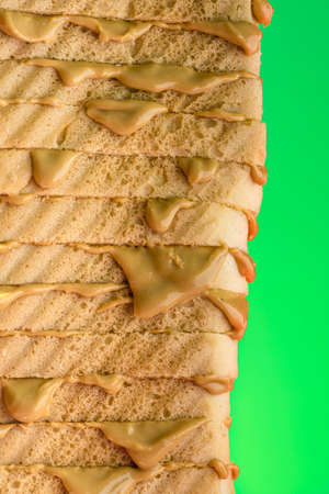 Bread with Peanut Butter  Sandwich Stack on Bright Background.