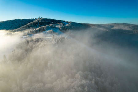Jaworzyna Mountain Peak Above Clouds. Aerial Drone View.