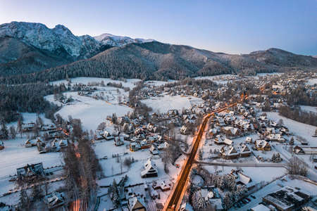 Snow in Zakopane at Winter. Aerial Drone Cityscape at Sunrise.の写真素材