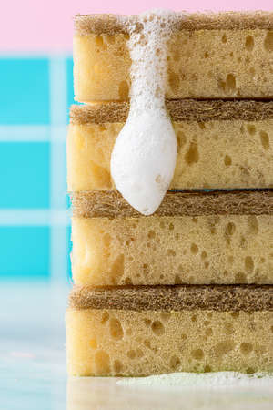 Sustainable eco friendly bamboo sponge on kitchen background. Copay space design for product mockup.の写真素材