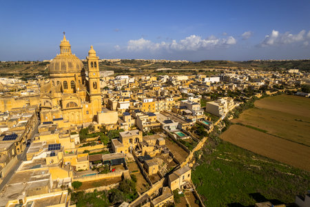 Aerial drone view of the Rotunda St. John Baptist Church in Xewkija, Gozo, Malta.の写真素材