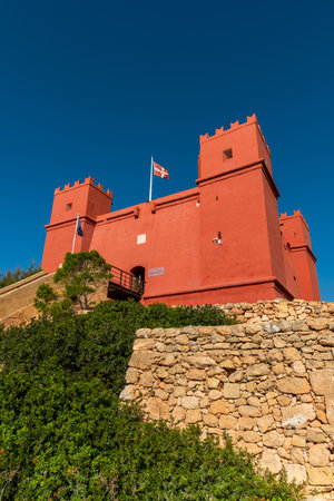 The red tower in Malta, known as St Agathaâ€™s Tower. Popular tourist destination in Malta.