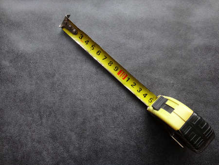 tape measure on gray backgroundの写真素材