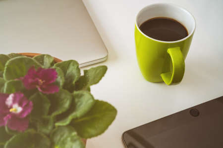 Flat lay composition with laptop and tablet on white background. Home officeの写真素材