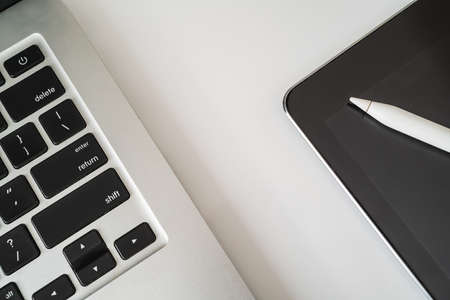 Flat lay composition with laptop and tablet on white background. Home office