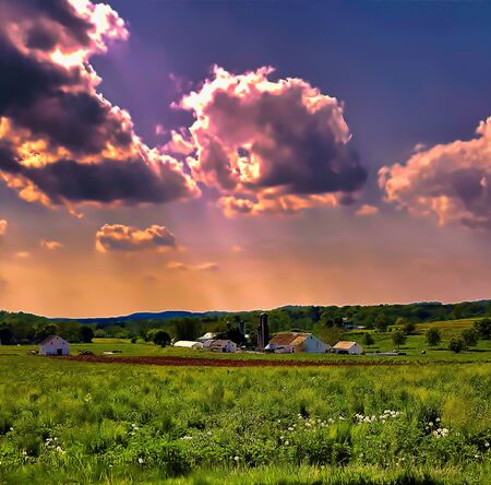 An amish farm at sunset with stunning sky, in Lancaster County, Pennsylvania