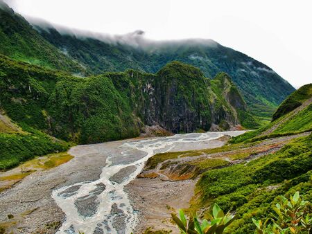 View of the melted ice flowing away from Fox Glacier, South Island, New Zealandの写真素材