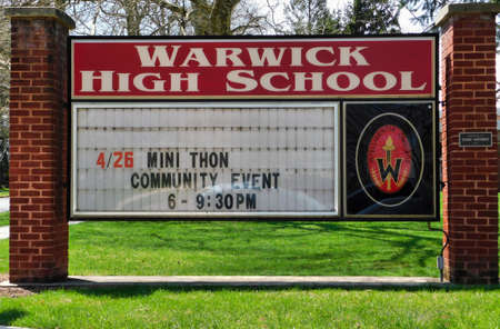 The Warwick High School sign out side of the high school near Lititz, Pennsylvania.  Taken April 13th, 2019 around 1:45 pmのeditorial素材