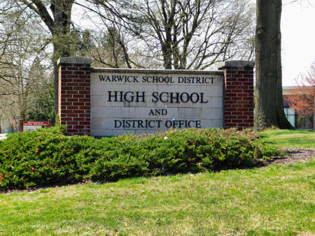 The Warwick school district and high school sign in Lititz, Pennsylvania.  Taken April 13th, 2019 around 1:45 pmのeditorial素材