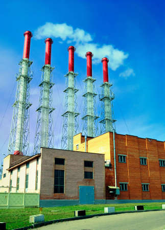 Smoking pipes of boiler-house polute environment.の写真素材