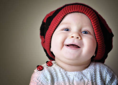 Face portrait of smiling kid in red beret.の写真素材
