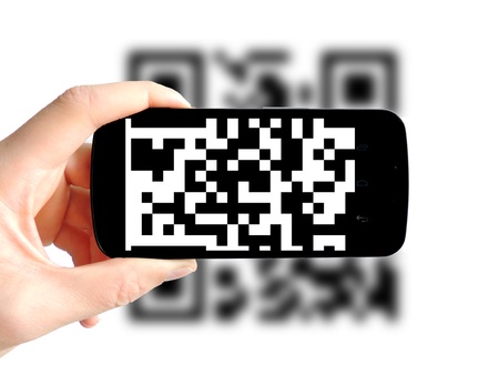 QR Code on smartphone isolated on white background