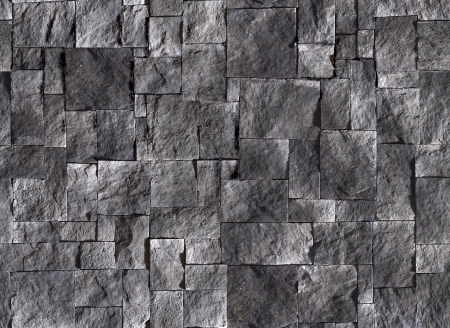 black and gray stone and concrete wall texture backgroundの写真素材