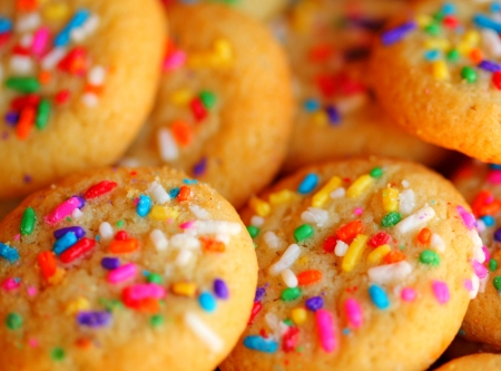 cake and sweet cookies with colored glaze background wallpaperの写真素材