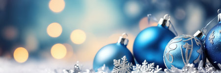 Blue christmas balls and snowflakes on bokeh backgroundの素材