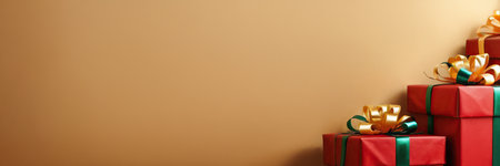 Christmas background with red gift boxes and golden bow on the wall.の素材