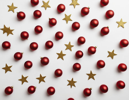 Red christmas balls and golden stars on white background, flat layの素材