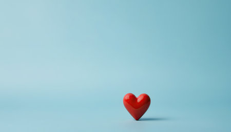 Red heart on blue background. Valentine's day concept. 3D Renderingの素材