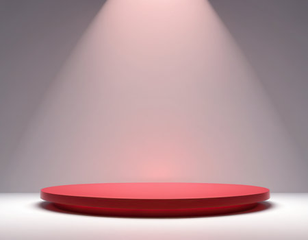 Red round podium illuminated by spotlights on white background. 3D renderingの素材