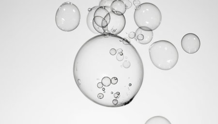 Bubbles floating in water on white background. 3d illustrationの素材