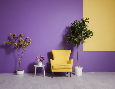 Interior of a modern living room with yellow armchair and plantの素材