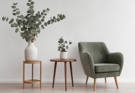 green armchair and vase with eucalyptus branchesの素材