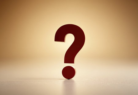 Question mark icon on wooden background with copy space. FAQ concept.の素材