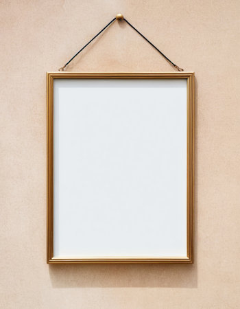 Blank picture frame hanging on the wall. Ready for your designの素材