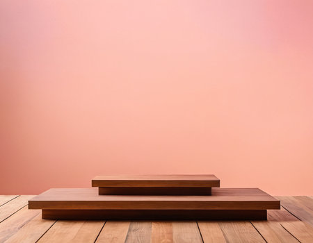 Wooden platform for product display on wooden floor with pink background.の素材