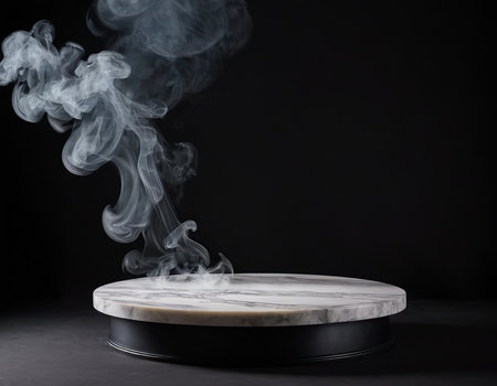 Round marble podium with smoke on black background. Mockup for designの素材