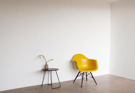 yellow chair and coffee table in empty room, interior design concept.の素材