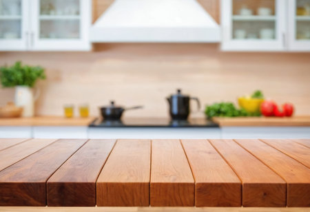 Empty wooden table and blurred kitchen interior background, product display montageの素材