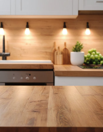 Empty wooden table and blurred kitchen interior background, product display montageの素材
