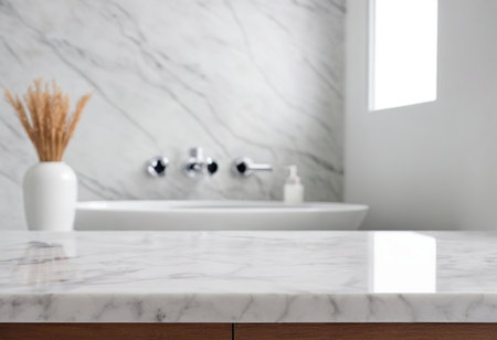 Close up of white marble countertop in modern bathroom with white tiles wallの素材