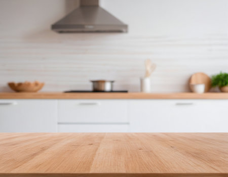 Empty wooden table and blurred kitchen interior background, product display montageの素材