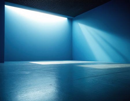 Blue wall and floor with spotlights in empty room. 3d renderingの素材