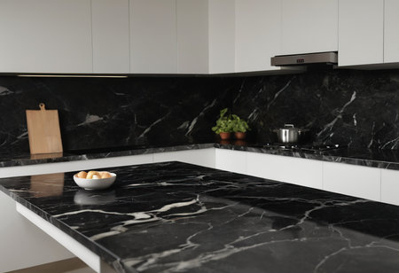 Luxury black and white modern kitchen with marble and granite countertopの素材