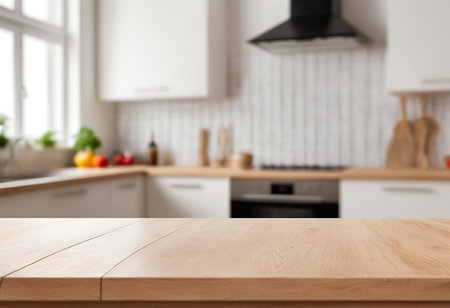 Empty wooden table and blurred kitchen interior background, product display montageの素材