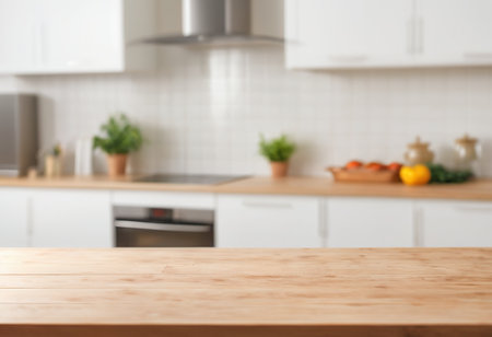 Empty wooden table and blurred kitchen interior background, product display montageの素材