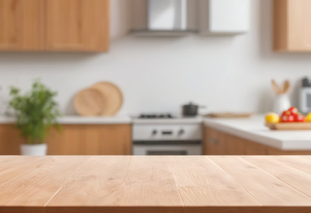 Empty wooden table and blurred kitchen interior background, product display montageの素材