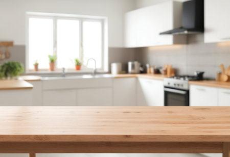 Empty wooden table and blurred kitchen interior background, product display montageの素材