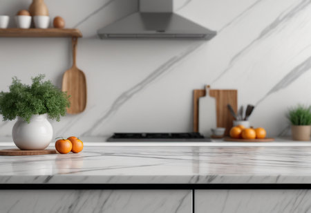 Close up of white marble countertop in modern kitchen with tangerinesの素材