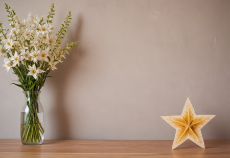 White daffodils in a vase and star on a wooden tableの素材